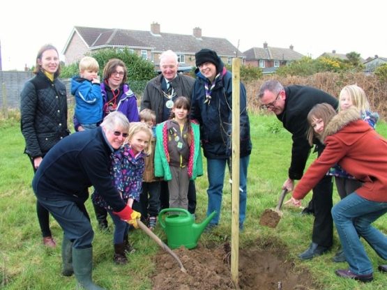 Group of people after planting tree